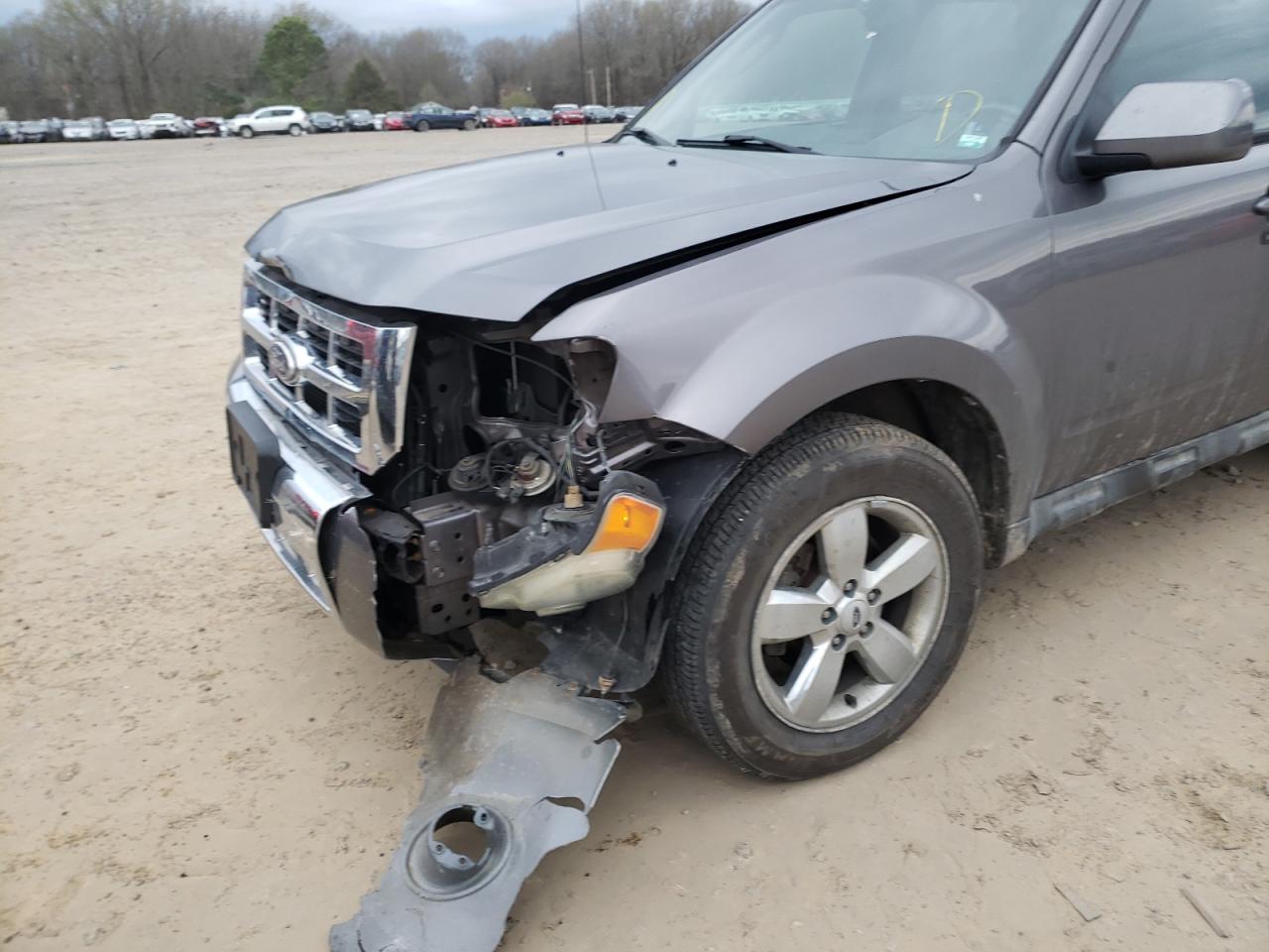 Photo 9 from auction – 2010 FORD ESCAPE LIM with VIN 1FMCU0EG6AKC46110