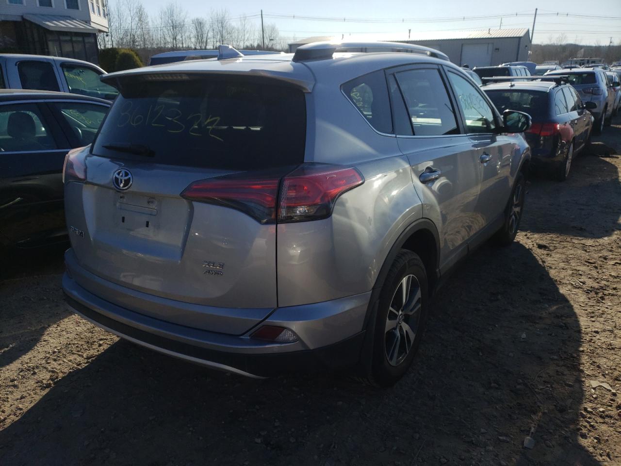 Photo 4 from auction – 2016 TOYOTA RAV4 XLE with VIN 2T3RFREV7GW482714