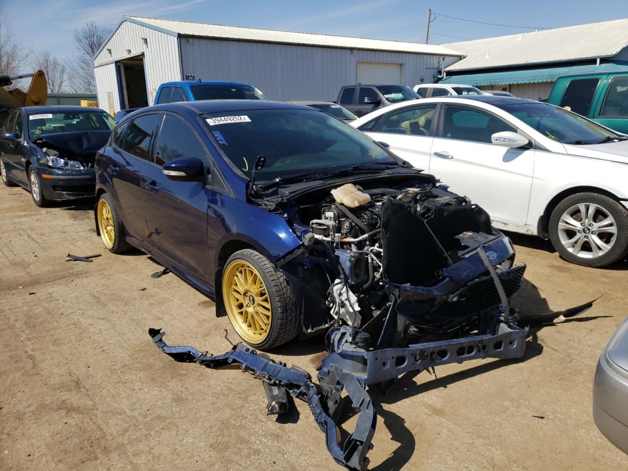 FORD FOCUS ST 2017 with VIN 1FADP3L94HL328336 - Photo from auction