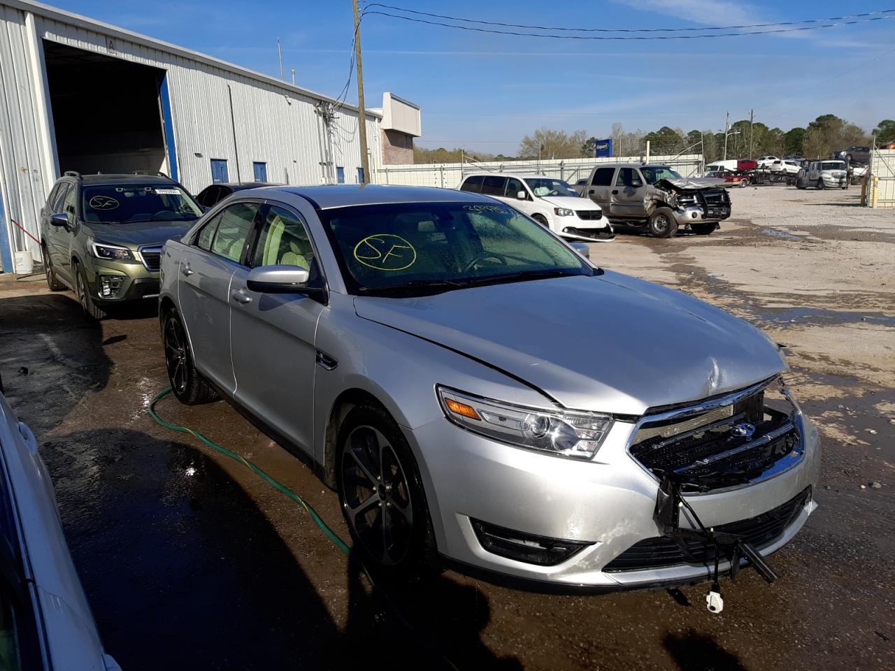 FORD TAURUS SEL 2014 with VIN 1FAHP2E89EG130579 - Photo from auction