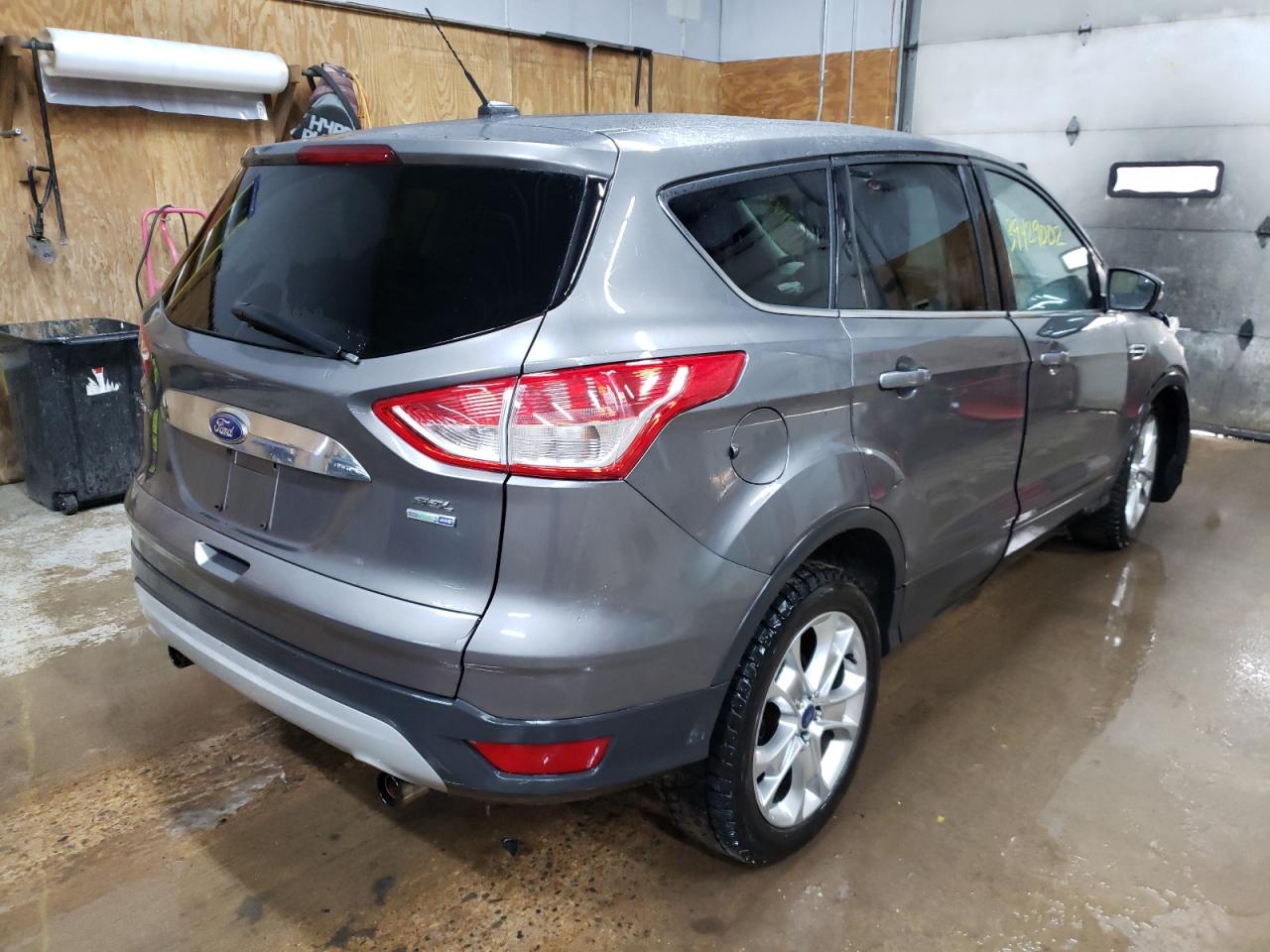 Photo 4 from auction – 2013 FORD ESCAPE SEL with VIN 1FMCU9H95DUD25293
