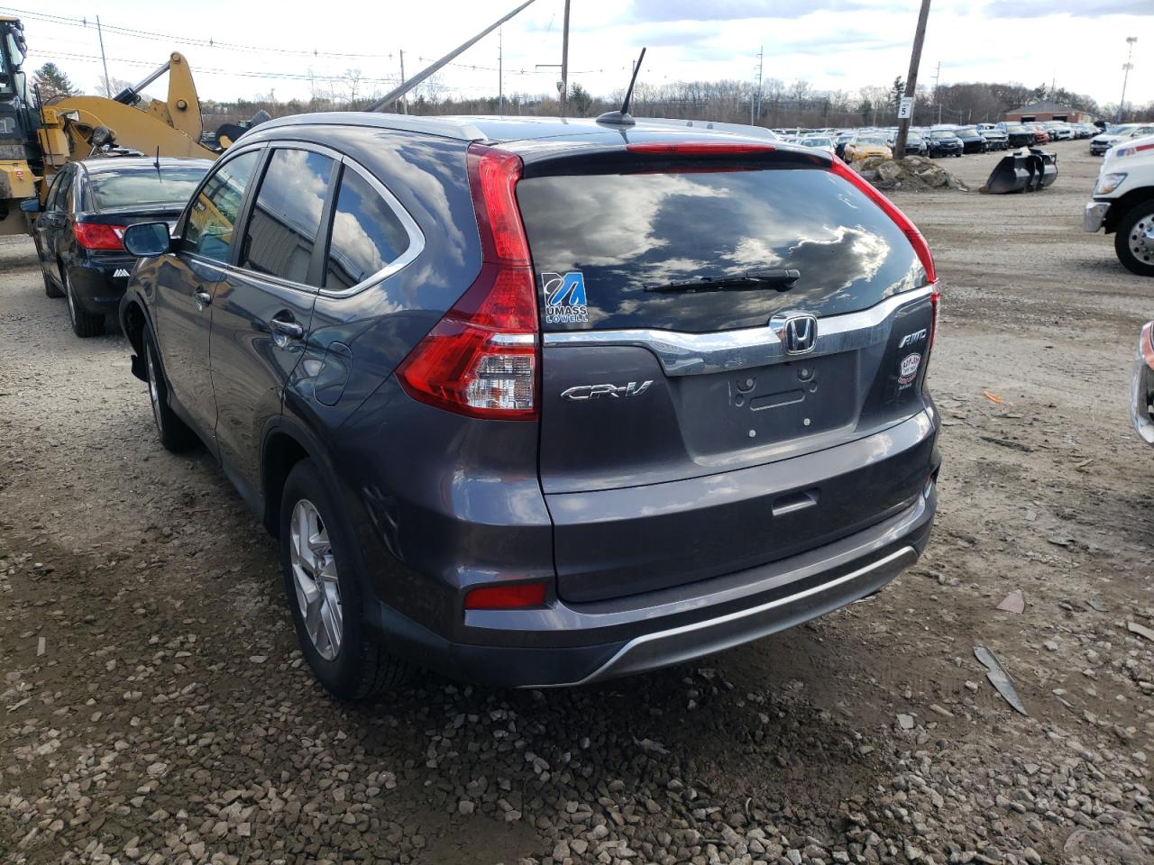 Photo 3 from auction – 2015 HONDA CR-V EXL with VIN 2HKRM4H76FH703375