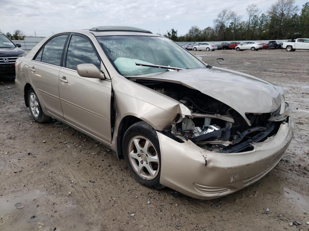 TOYOTA CAMRY LE 2002 with VIN 4T1BE32K42U512071 - Photo from auction