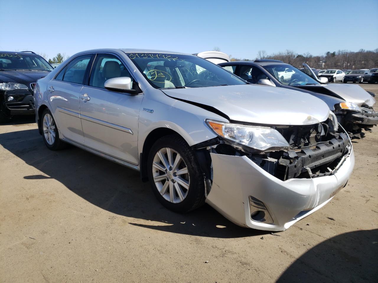 TOYOTA CAMRY HYBR 2014 with VIN 4T1BD1FK2EU134161 - Photo from auction