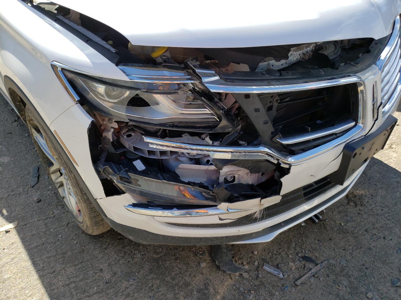 Photo 9 from auction – 2015 LINCOLN MKC with VIN 5LMTJ2AH2FUJ33217
