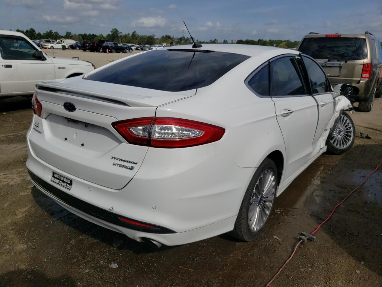 Photo 4 from auction – 2014 FORD FUSION TIT with VIN 3FA6P0RU4ER261401