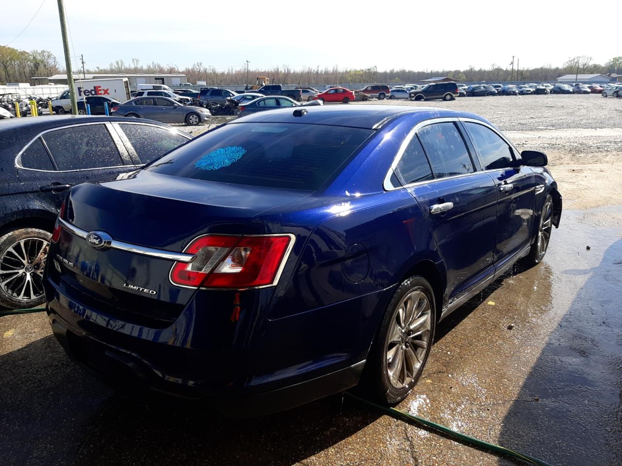 Photo 4 from auction – 2011 FORD TAURUS with VIN 1FAHP2FW3BG158435