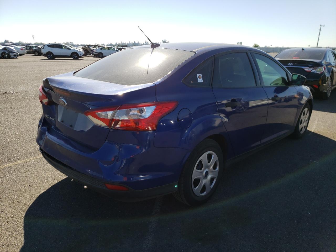 Photo 4 from auction – 2012 FORD FOCUS S with VIN 1FAHP3E28CL468545