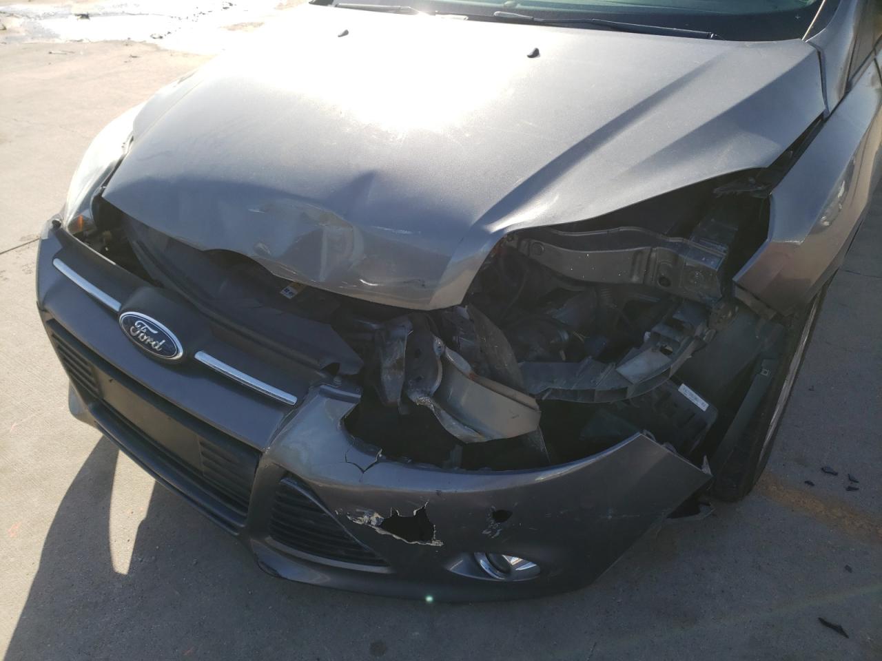 Photo 9 from auction – 2012 FORD FOCUS SE with VIN 1FAHP3F20CL319545