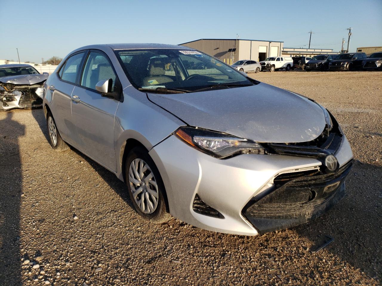 TOYOTA COROLLA L 2017 with VIN 5YFBURHE8HP654831 - Photo from auction