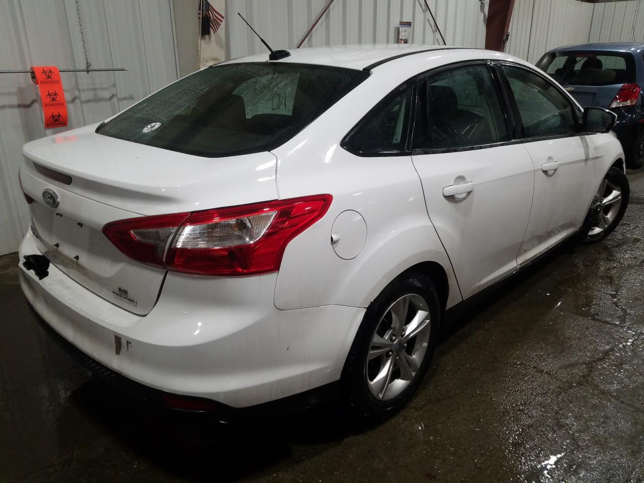Photo 4 from auction – 2014 FORD FOCUS SE with VIN 1FADP3F2XEL132749