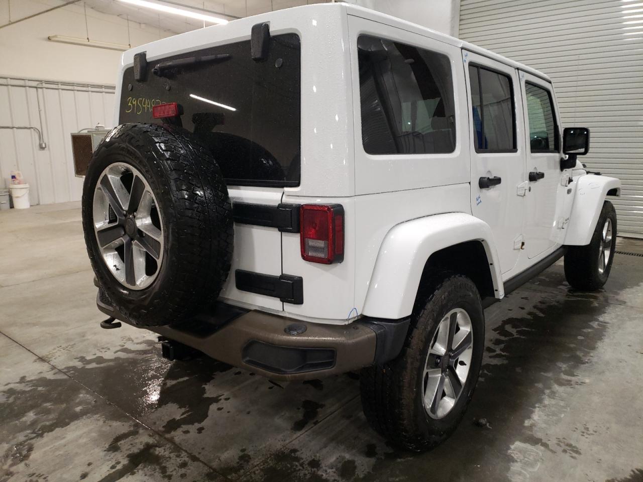 Photo 4 from auction – 2016 JEEP WRANGLER U with VIN 1C4HJWEG2GL293045