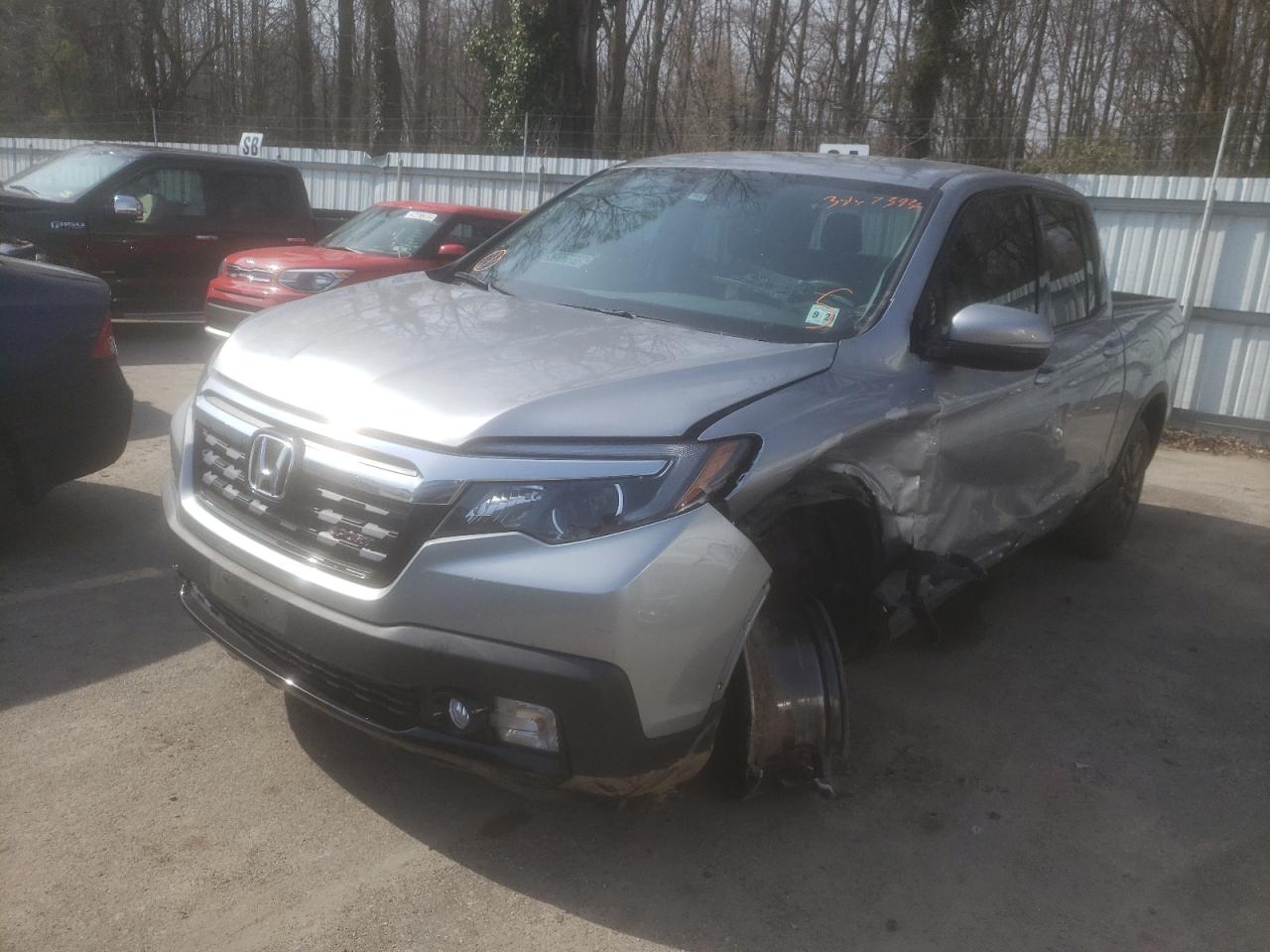 Photo 2 from auction – 2019 HONDA RIDGELINE with VIN 5FPYK3F17KB045303