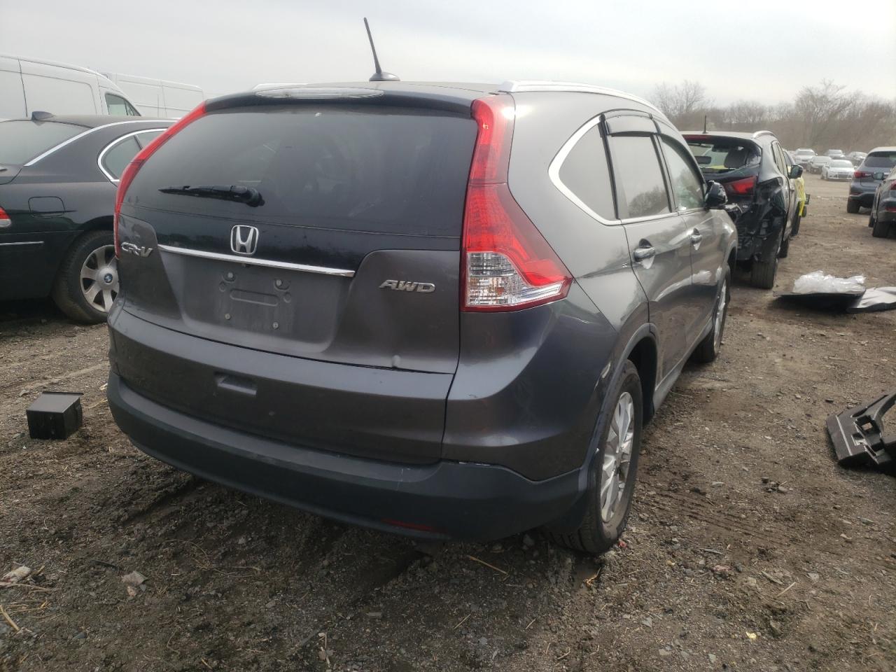 Photo 4 from auction – 2013 HONDA CR-V EXL with VIN 2HKRM4H79DH685774