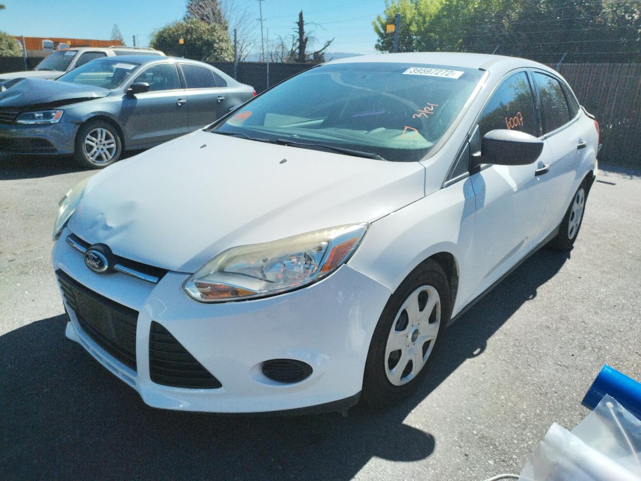 Photo 2 from auction – 2014 FORD FOCUS S with VIN 1FADP3E25EL255120