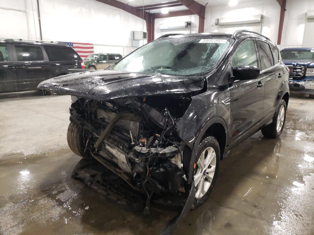Photo 2 from auction – 2018 FORD ESCAPE SEL with VIN 1FMCU9HD9JUD59771