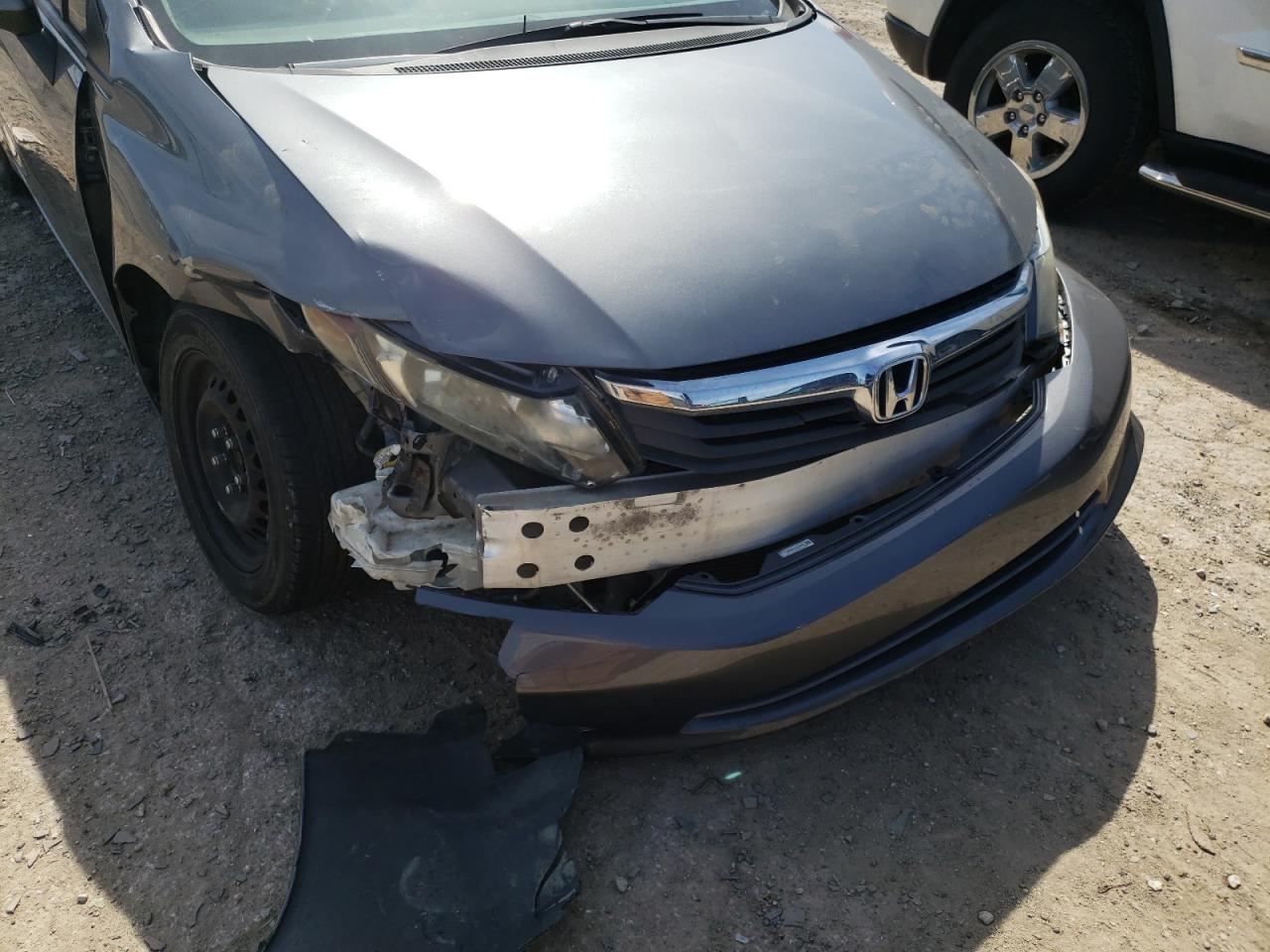 Photo 9 from auction – 2012 HONDA CIVIC LX with VIN 19XFB2F51CE093450