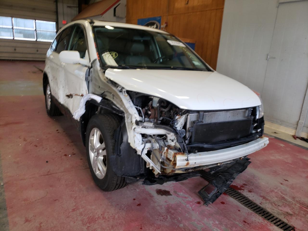 Photo 9 from auction – 2011 HONDA CR-V EXL with VIN 5J6RE4H77BL095895
