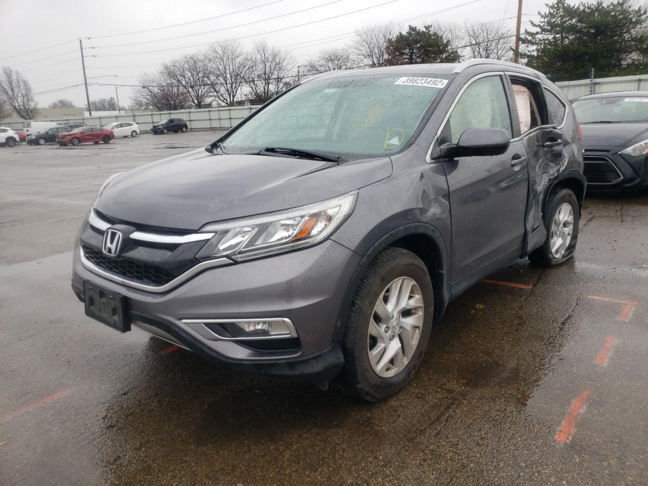 Photo 2 from auction – 2016 HONDA CR-V EXL with VIN 2HKRM4H75GH697389