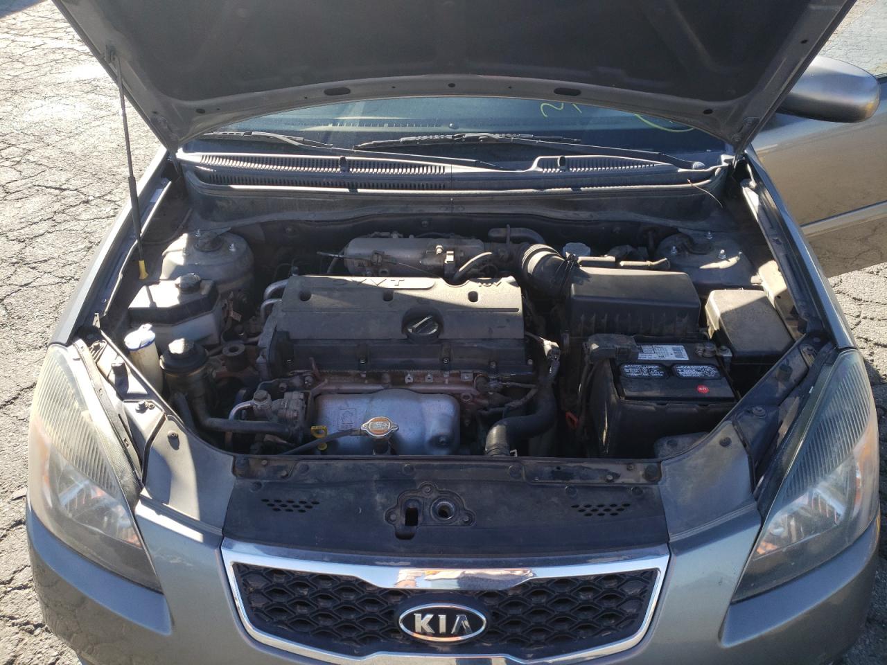 Photo 7 from auction – 2011 KIA RIO BASE with VIN KNADH4A32B6949914