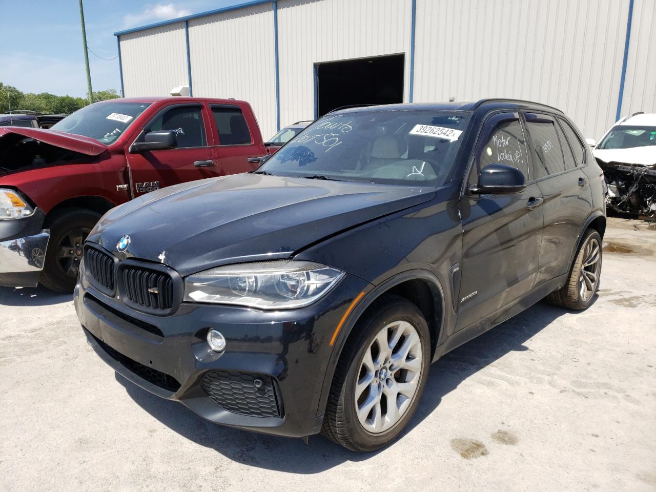 Photo 2 from auction – 2014 BMW X5 XDRIVE5 with VIN 5UXKR6C50E0J73483