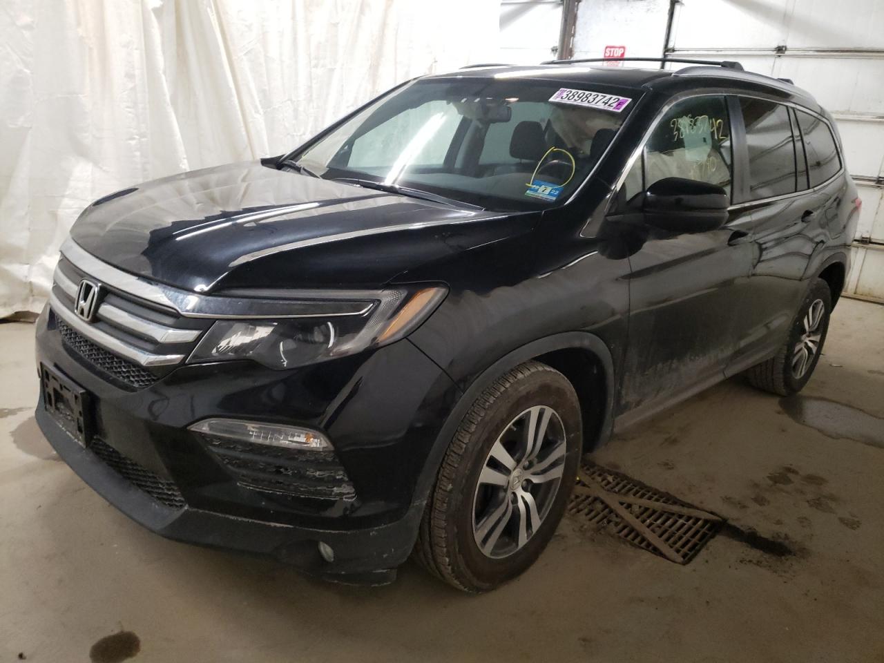 Photo 2 from auction – 2016 HONDA PILOT EXL with VIN 5FNYF6H50GB011614