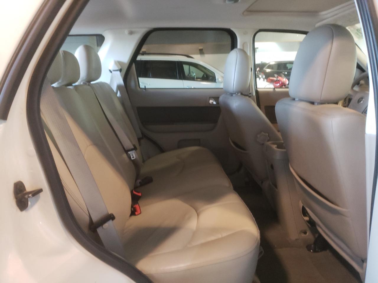 Photo 6 from auction – 2010 MERCURY MARINER PR with VIN 4M2CN8H78AKJ04881