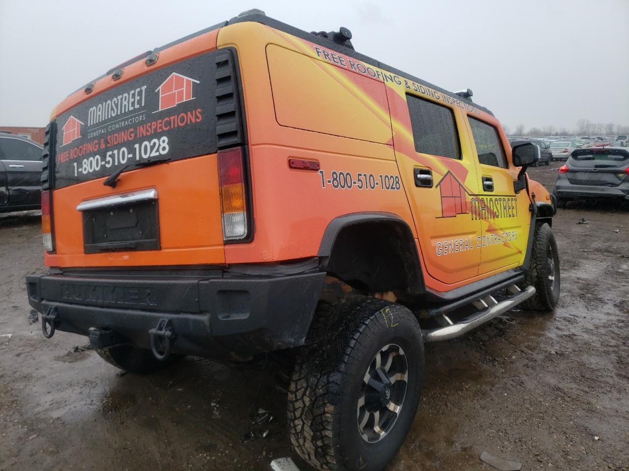 Photo 4 from auction – 2003 HUMMER H2 with VIN 5GRGN23U13H136930