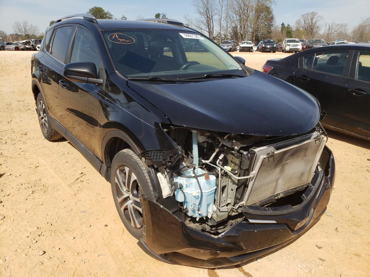 TOYOTA RAV4 LE 2018 with VIN 2T3ZFREV0JW462179 - Photo from auction