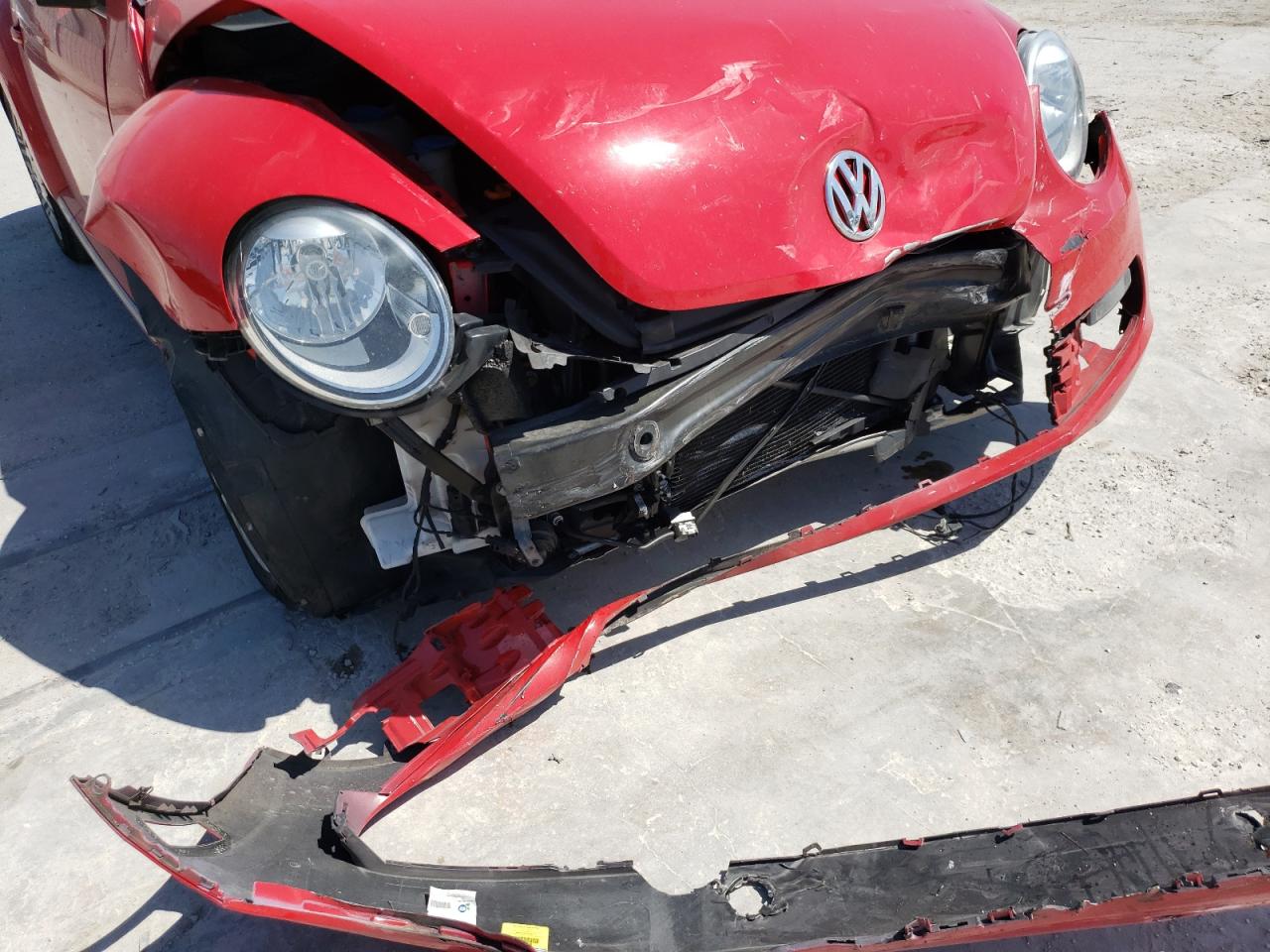 Photo 9 from auction – 2014 VOLKSWAGEN BEETLE with VIN 3VW5X7AT2EM805843