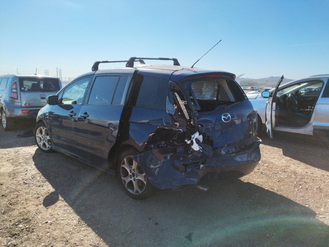 Photo 3 from auction – 2009 MAZDA 5 with VIN JM1CR293590342634