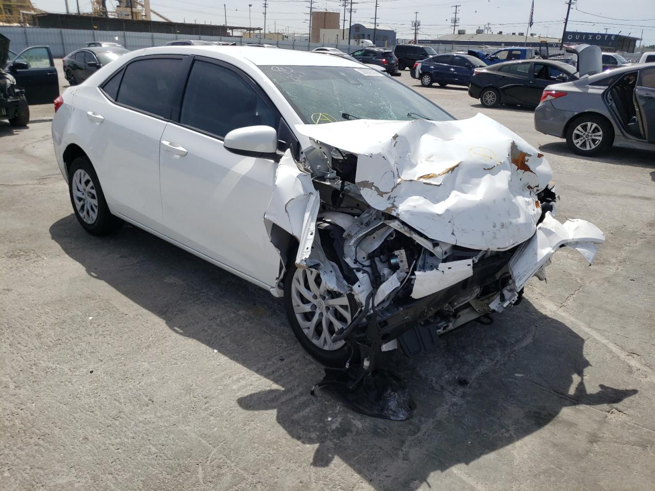 TOYOTA COROLLA L 2018 with VIN 5YFBURHE5JP761034 - Photo from auction