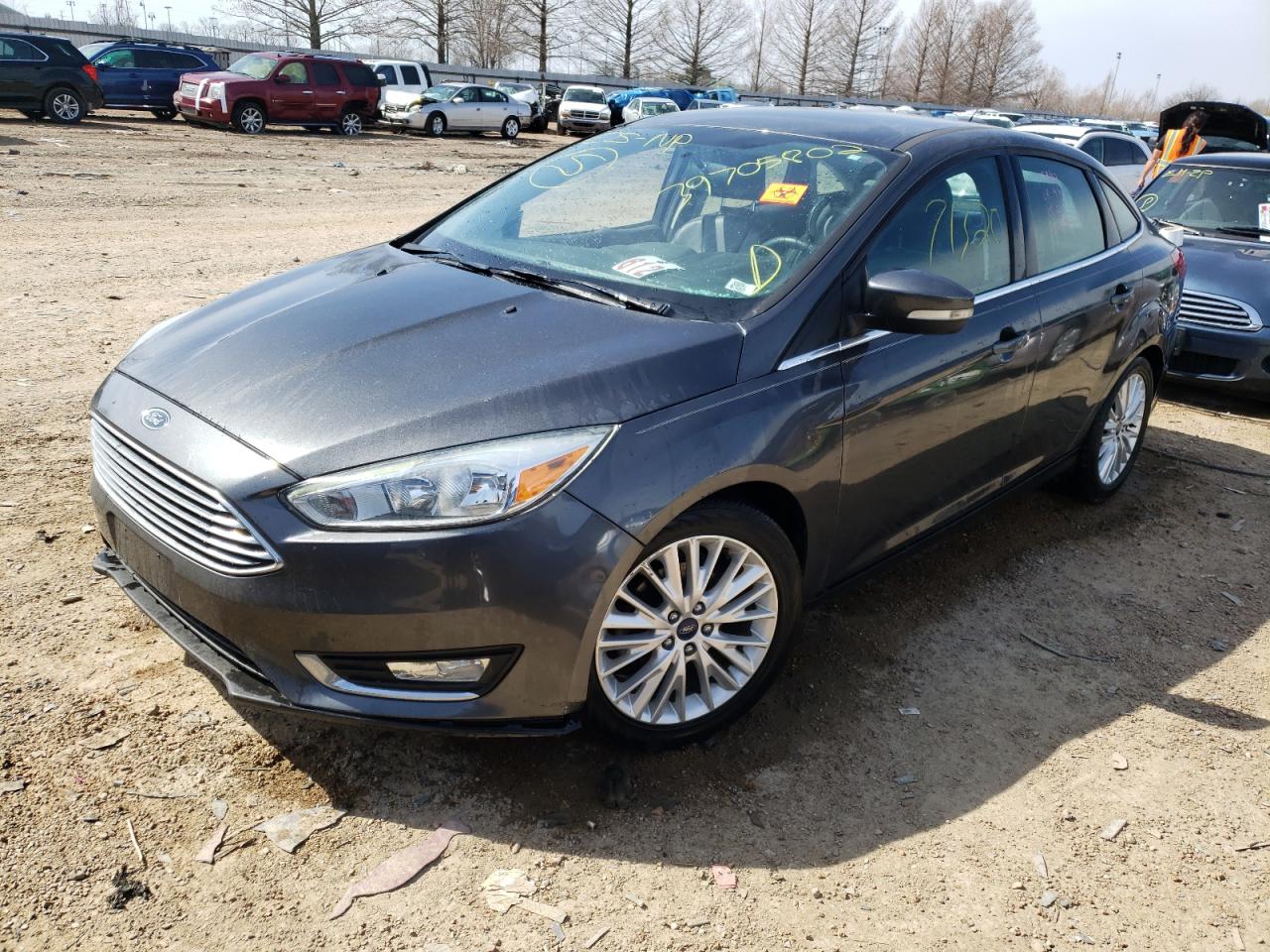 Photo 2 from auction – 2016 FORD FOCUS TITA with VIN 1FADP3J29GL344083