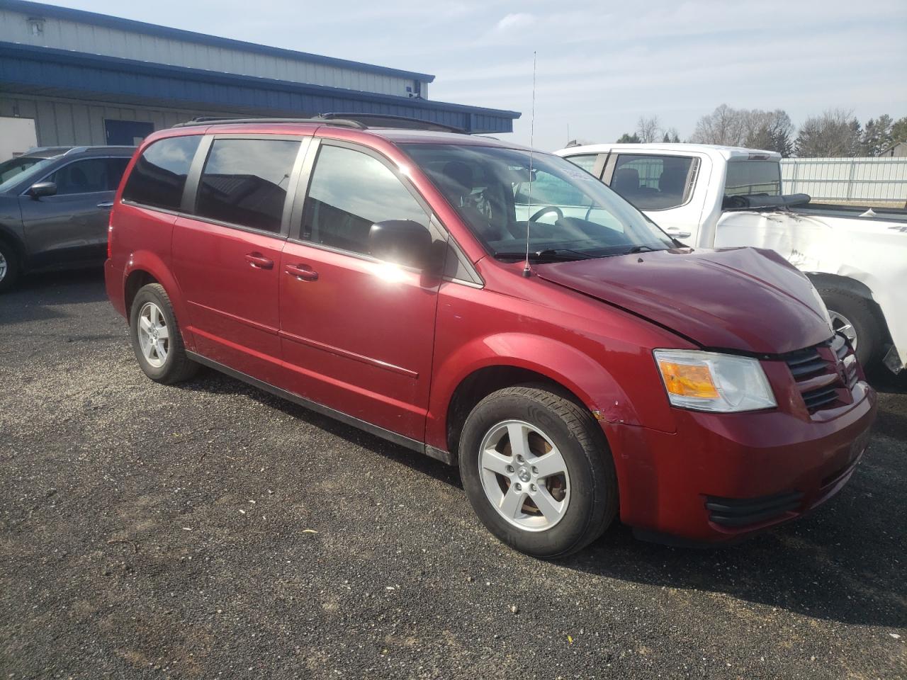 DODGE GRAND CARA 2010 with VIN 2D4RN3D15AR402233 - Photo from auction