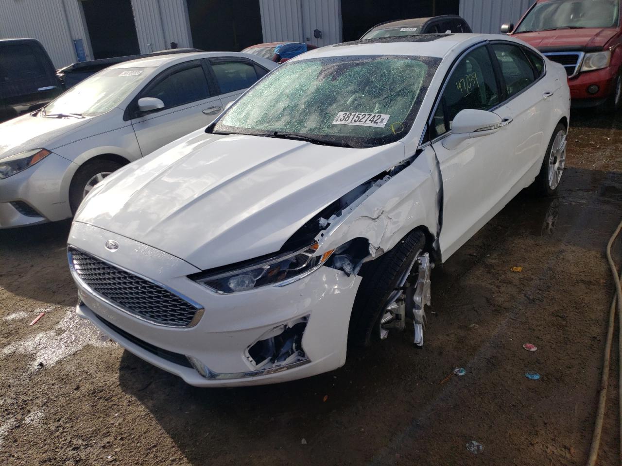 Photo 2 from auction – 2019 FORD FUSION TIT with VIN 3FA6P0D90KR143277