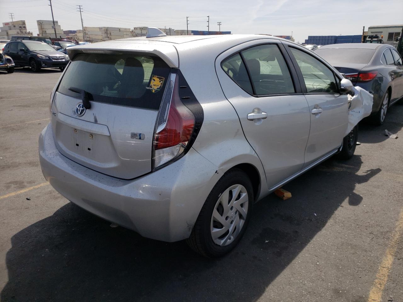 Photo 4 from auction – 2015 TOYOTA PRIUS C with VIN JTDKDTB36F1107501