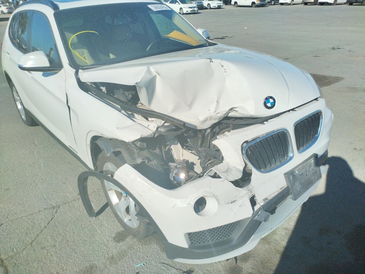 Photo 9 from auction – 2015 BMW X1 SDRIVE2 with VIN WBAVM1C51FV498287