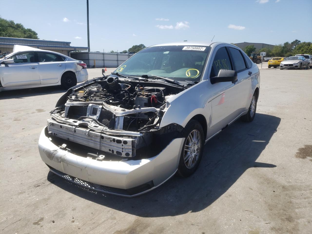 Photo 2 from auction – 2011 FORD FOCUS SE with VIN 1FAHP3FN7BW125599