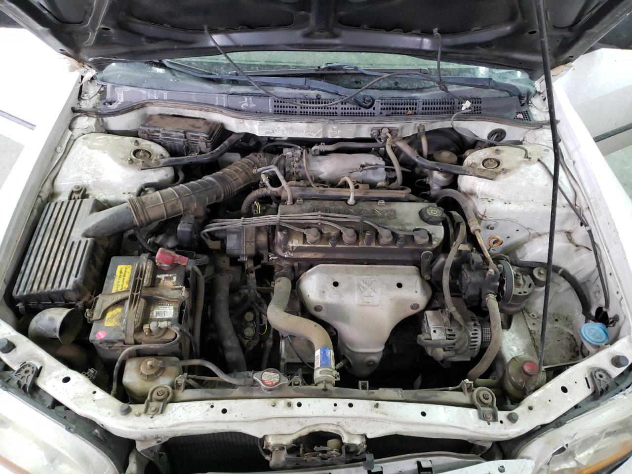 Photo 7 from auction – 2002 HONDA ACCORD DX with VIN JHMCF86452C000323