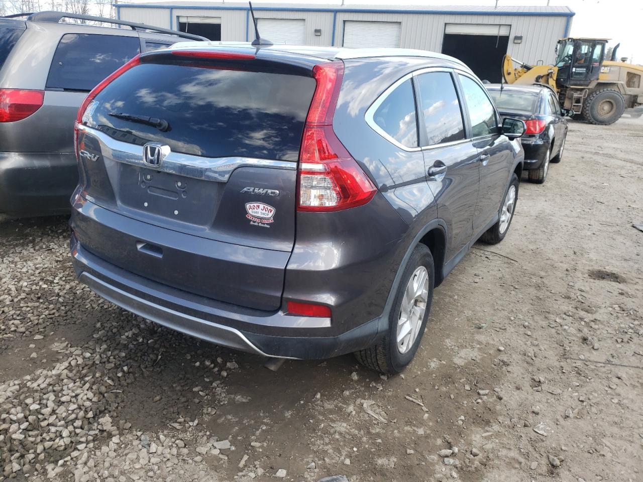Photo 4 from auction – 2015 HONDA CR-V EXL with VIN 2HKRM4H76FH703375