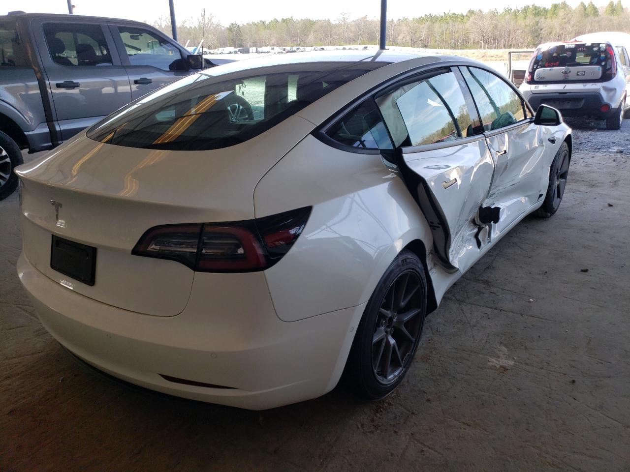 Photo 4 from auction – 2021 TESLA MODEL 3 with VIN 5YJ3E1EA3MF861380