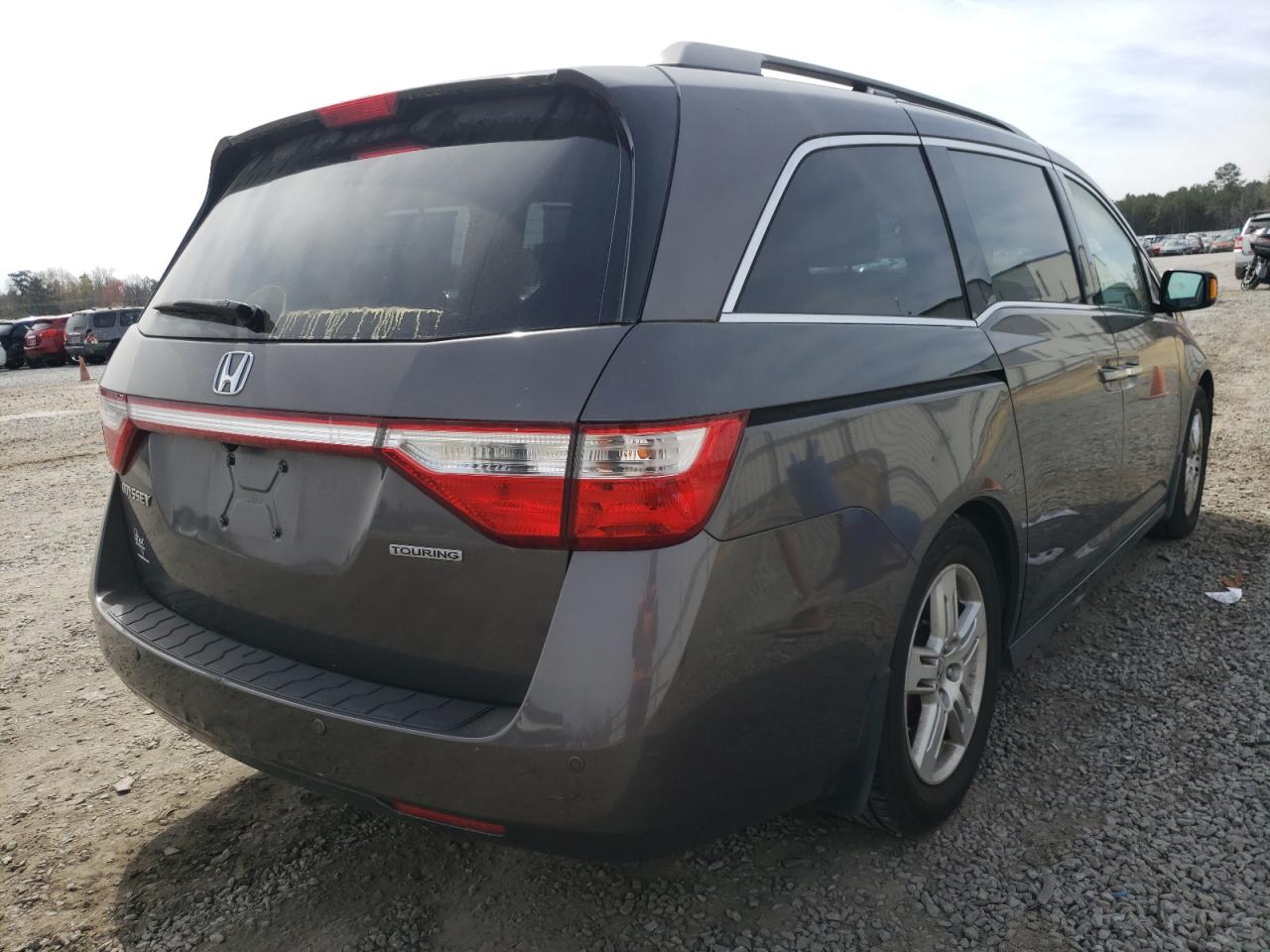 Photo 4 from auction – 2011 HONDA ODYSSEY TO with VIN 5FNRL5H98BB039664