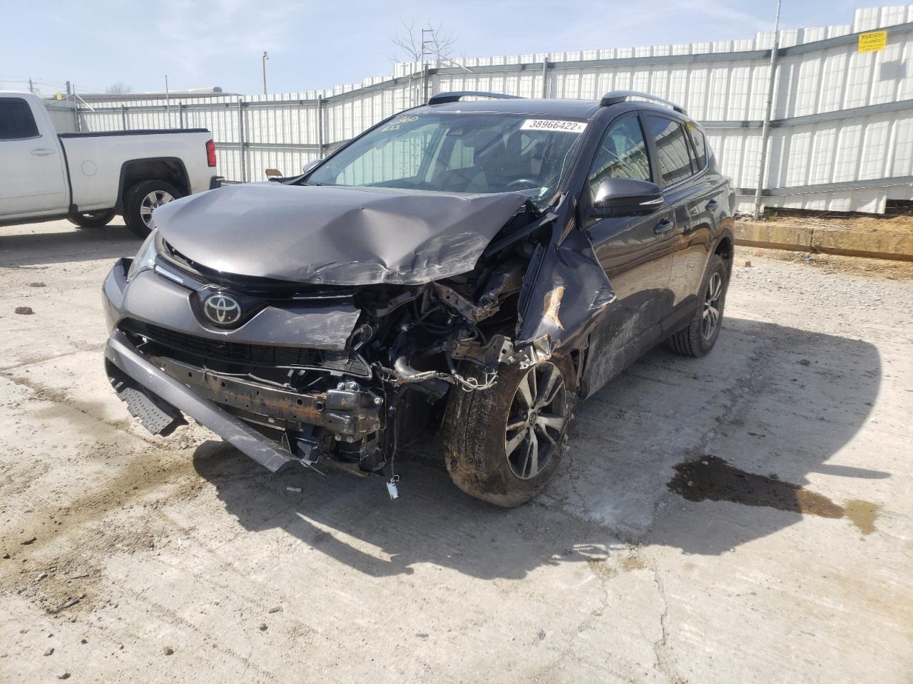 Photo 2 from auction – 2017 TOYOTA RAV4 XLE with VIN 2T3WFREV7HW317010