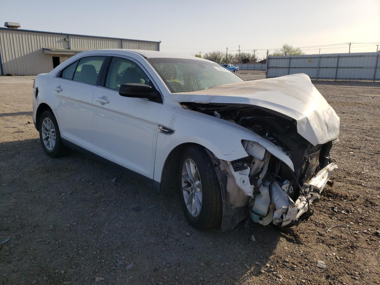 FORD TAURUS SE 2015 with VIN 1FAHP2D86FG123950 - Photo from auction