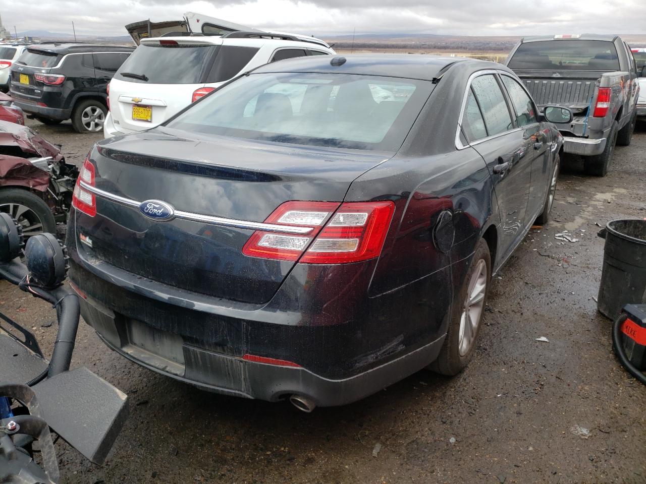 Photo 4 from auction – 2014 FORD TAURUS SEL with VIN 1FAHP2E84EG159424