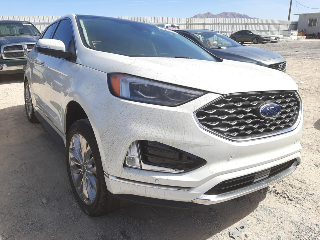 FORD EDGE TITAN 2021 with VIN 2FMPK4K96MBA58531 - Photo from auction
