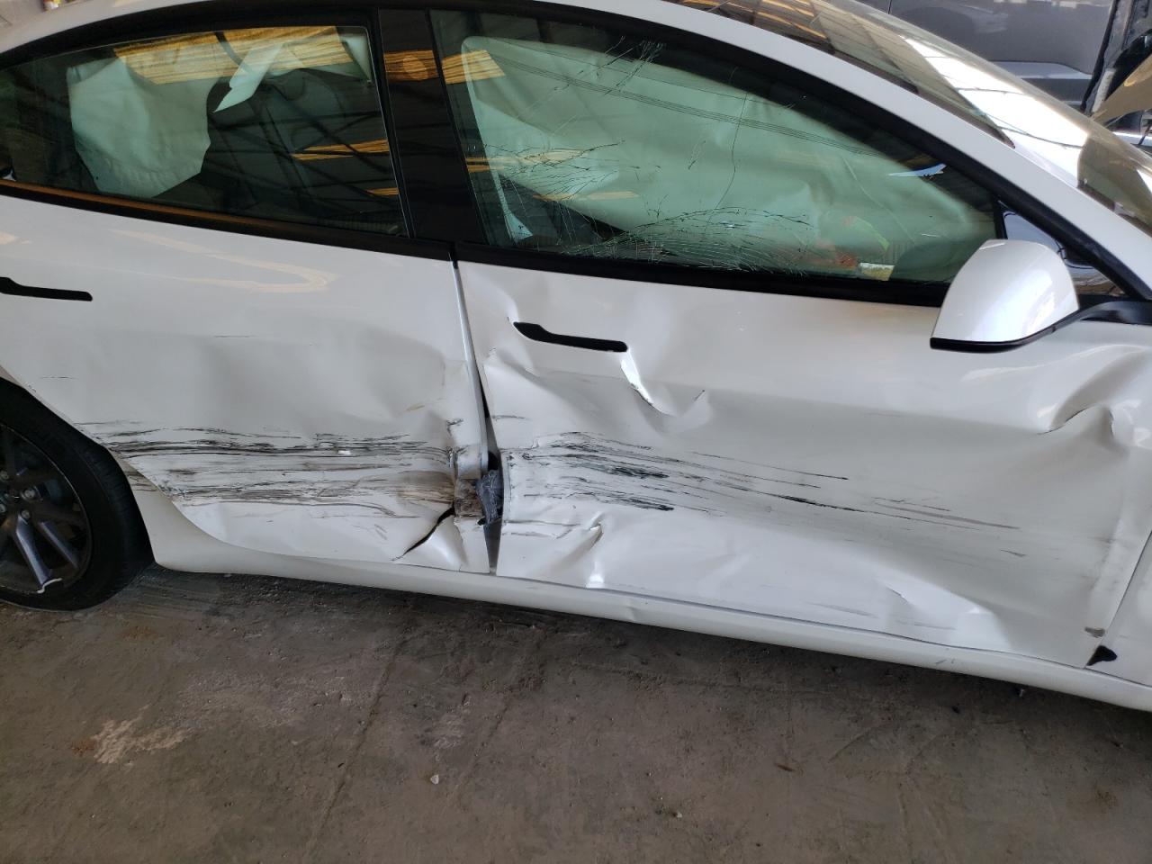 Photo 9 from auction – 2021 TESLA MODEL 3 with VIN 5YJ3E1EA3MF861380
