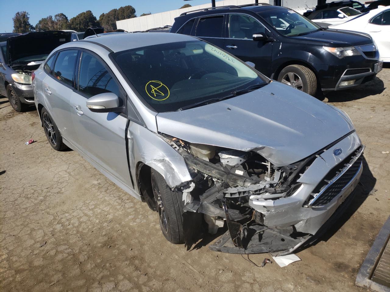 FORD FOCUS SE 2015 with VIN 1FADP3F2XFL334671 - Photo from auction