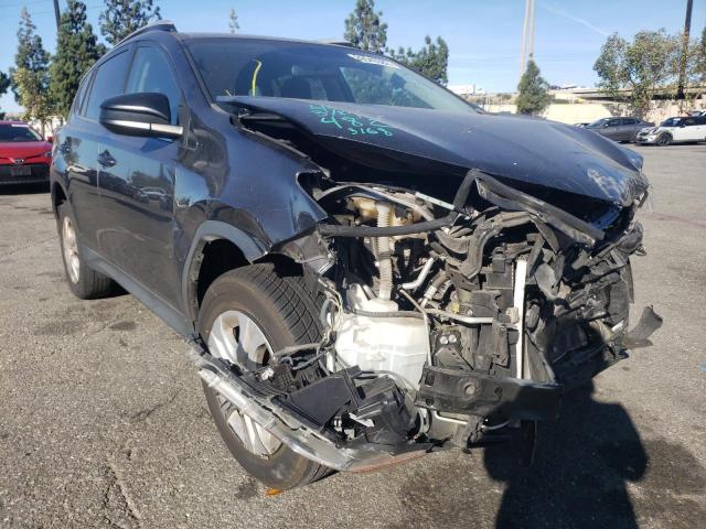 TOYOTA RAV4 LE 2014 with VIN JTMZFREV8EJ023168 - Photo from auction