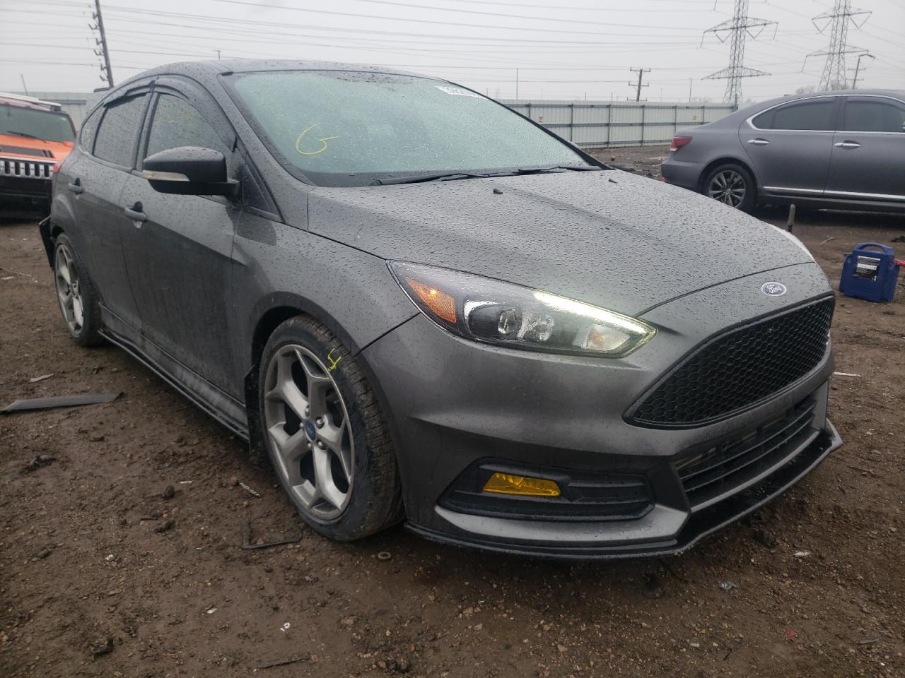 FORD FOCUS ST 2016 with VIN 1FADP3L9XGL215487 - Photo from auction